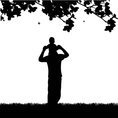 Bir çocuk parkta onun omuzlarında taşıyan baba