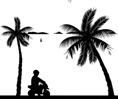 Çocuk sahilde bir motosiklet oyuncak sürmek