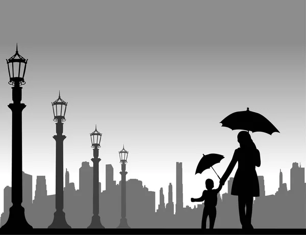 Mother walking under the umbrellas with her child on the street — Stock Vector