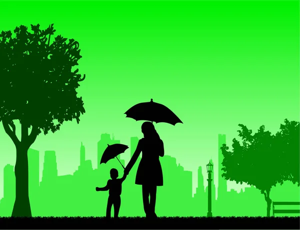 Mother walking under the umbrellas with her child in park — Stock Vector