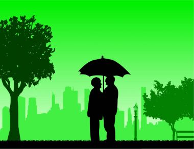 Park şemsiyesi altında güzel emekli yaşlı çift standları