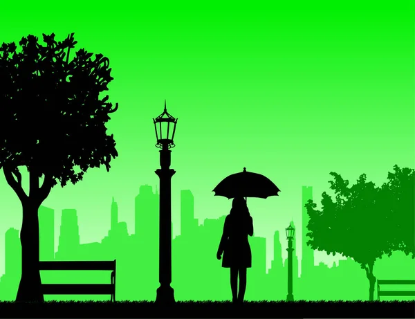 Junge Frau läuft unter dem Regenschirm im Park — Stockvektor