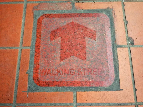 Follow the arrows to find walking street.