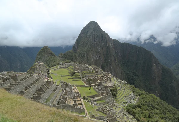 Ruinas de Machu Picchu en Perú. Patrimonio Mundial de la UNESCO desde 1983 — Foto de Stock