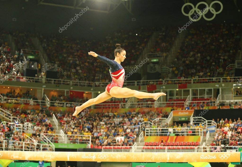 RIO DE JANEIRO, BRAZIL - AUGUST 9, 2016: Olympic champion Aly Raisman of United States competes on the balance beam at women's team all-around gymnastics at Rio 2016 Olympic Games at Rio Olympic Arena