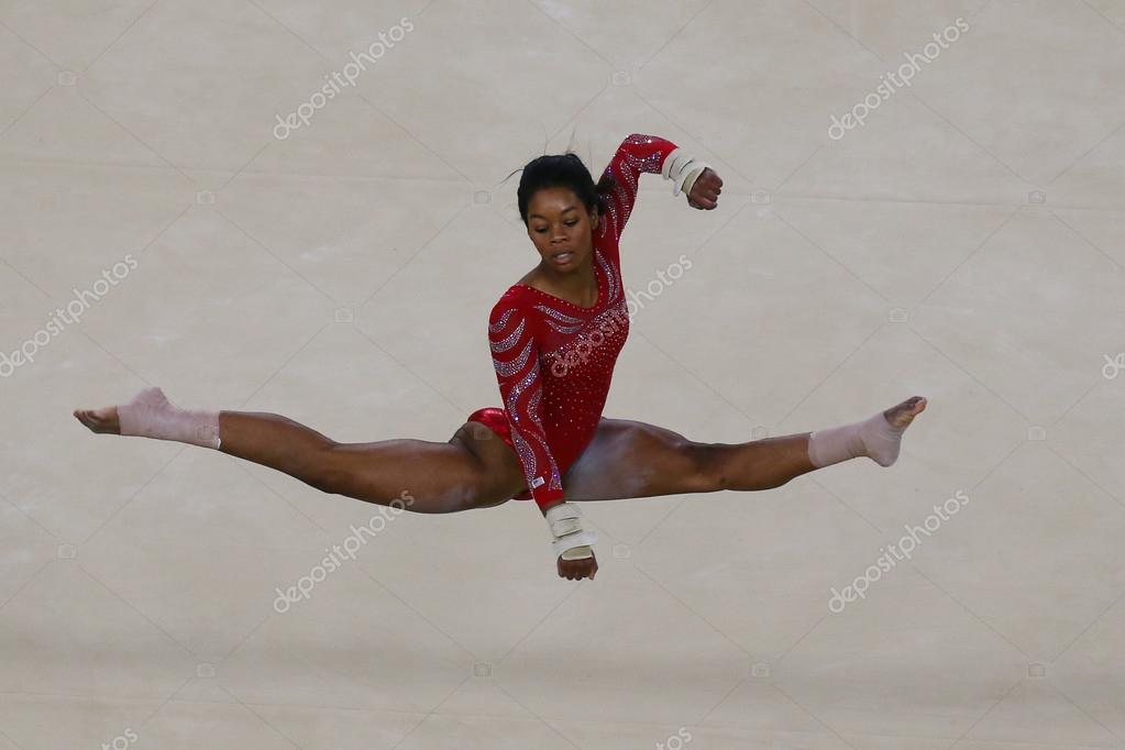 RIO DE JANEIRO, BRAZIL - AUGUST 4, 2016: Olympic champion Gabby Douglas of United States during an artistic gymnastics floor exercise training session for Rio 2016 Olympics at the Rio Olympic Arena