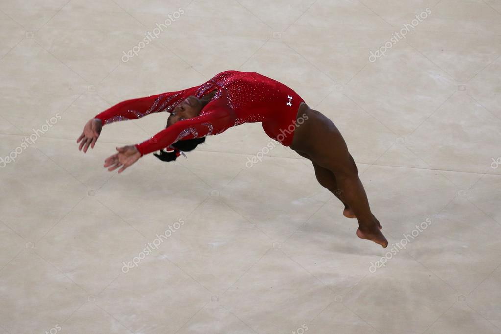RIO DE JANEIRO, BRAZIL - AUGUST 4, 2016: Olympic champion Simone Biles of United States during an artistic gymnastics floor exercise training session for Rio 2016 Olympics at the Rio Olympic Arena