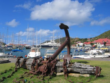 Giant anchor at Gustavia waterfront at St Barts clipart
