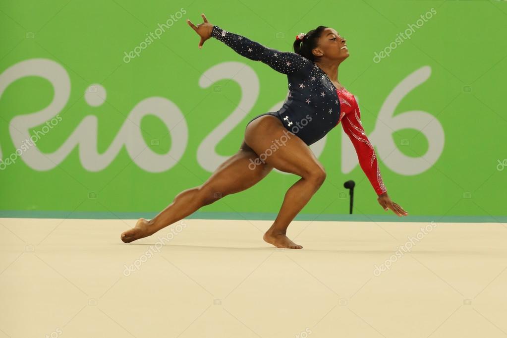 RIO DE JANEIRO, BRAZIL AUGUST 7, 2016: Olympic champion Simone Biles of United States competes on the floor exercise during women's all-around gymnastics qualification at Rio 2016 Olympic Games