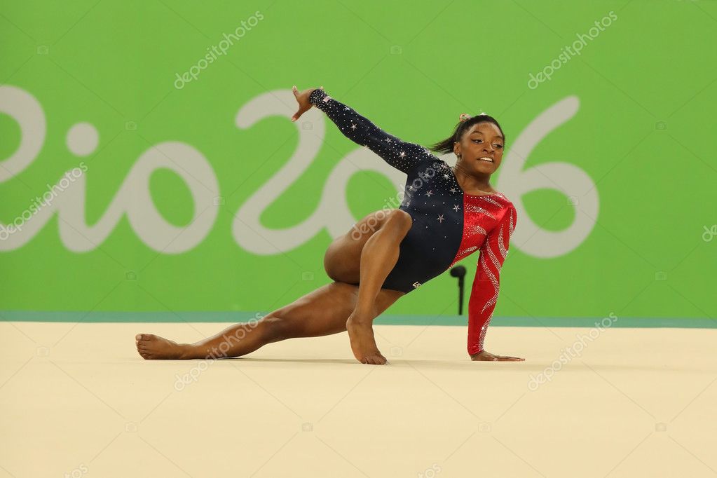 RIO DE JANEIRO, BRAZIL AUGUST 7, 2016: Olympic champion Simone Biles of United States competes on the floor exercise during women's all-around gymnastics qualification at Rio 2016 Olympic Games