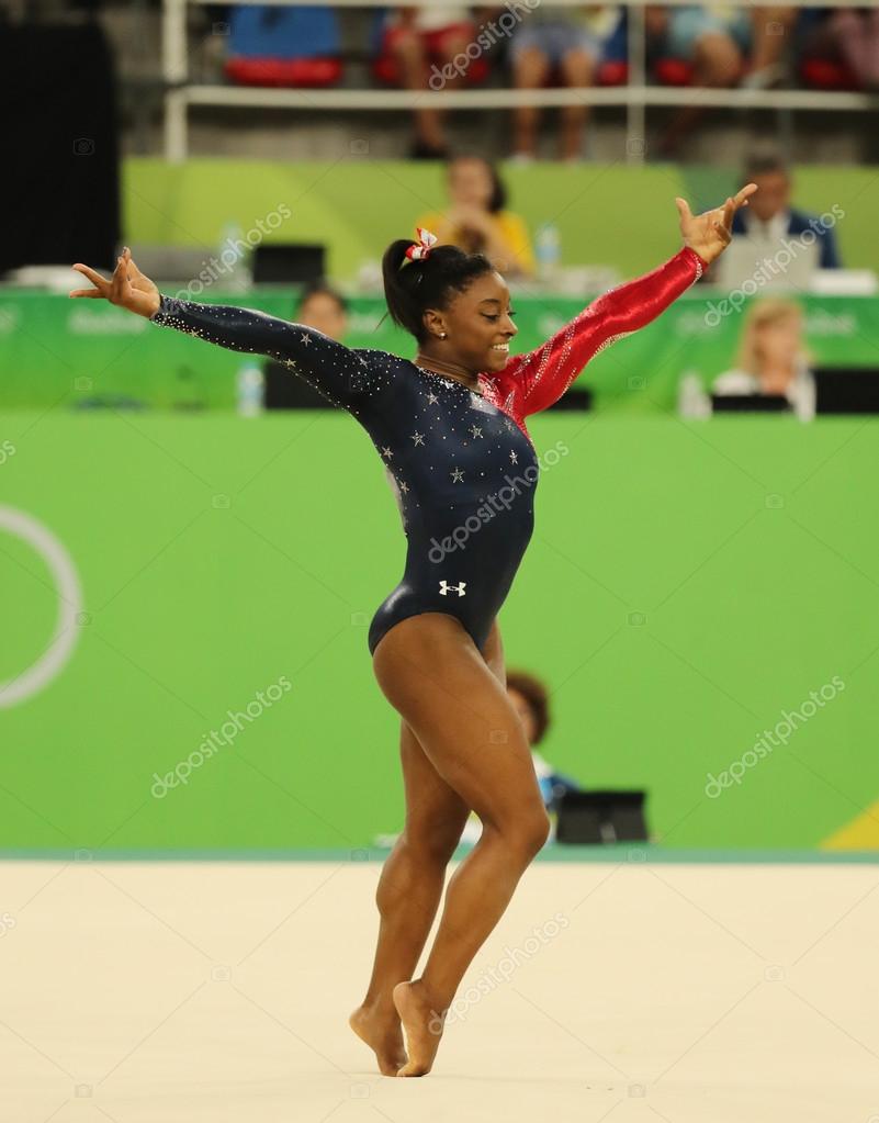 RIO DE JANEIRO, BRAZIL AUGUST 7, 2016: Olympic champion Simone Biles of United States competes on the floor exercise during women's all-around gymnastics qualification at Rio 2016 Olympic Games