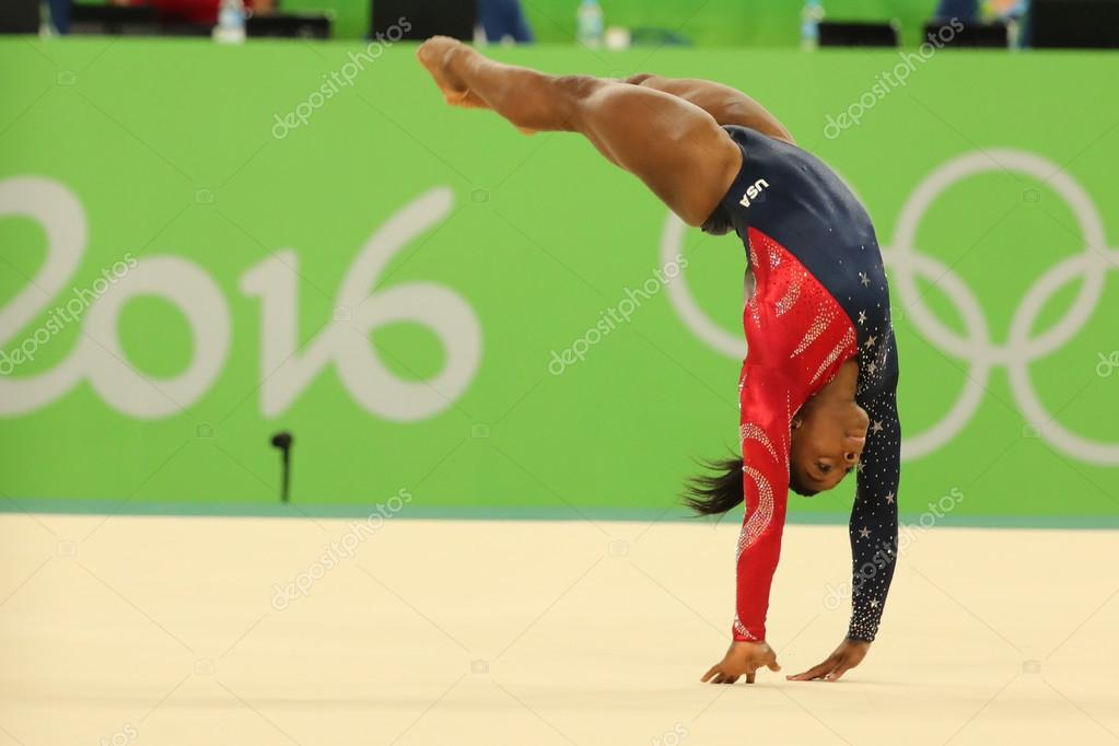 RIO DE JANEIRO, BRAZIL - AUGUST 7, 2016: Olympic champion Simone Biles of United States competes on the floor exercise during women's all-around gymnastics qualification at Rio 2016 Olympic Games