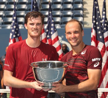 US Open 2016 men doubles champions Jamie Murray (L) of Great Britain and Bruno Soares of Brazil during trophy presentation  clipart