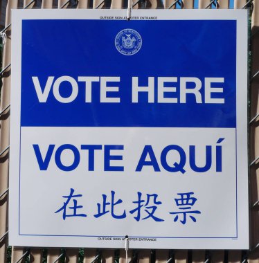 Sign at the voting site in New York clipart