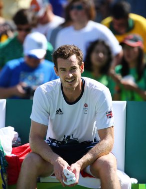 Olympic champion Andy Murray of Great Britain celebrates victory after men's singles semifinal of the Rio 2016 Olympic Games clipart
