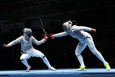 Ibtihaj Muhammed, Amerika Birleşik Devletleri (R) ve Sofya Velikaya Rusya'nın kadın Sabre Takım Rio 2016 Olimpiyat Oyunları rekabet