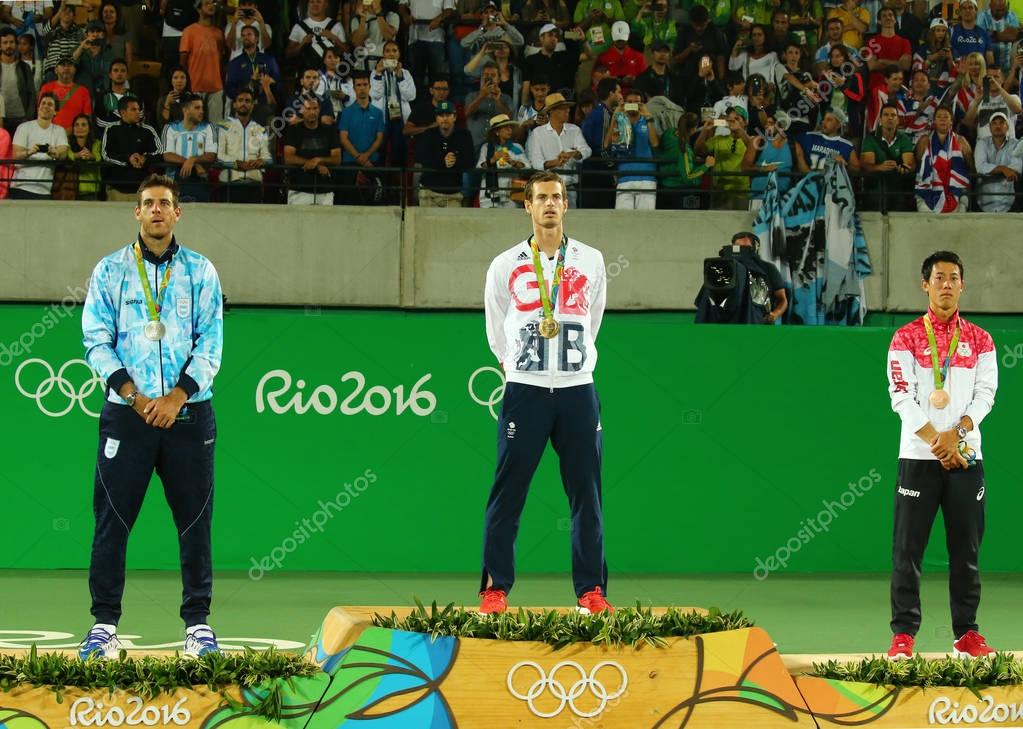 RIO DE JANEIRO, BRAZIL - AUGUST 14, 2016:Juan Martin Del Porto ARG (L), Olympic champion Andy Murray GBR and Kei Nishikori JPN during tennis men's singles medal ceremony of the Rio 2016 Olympic Games