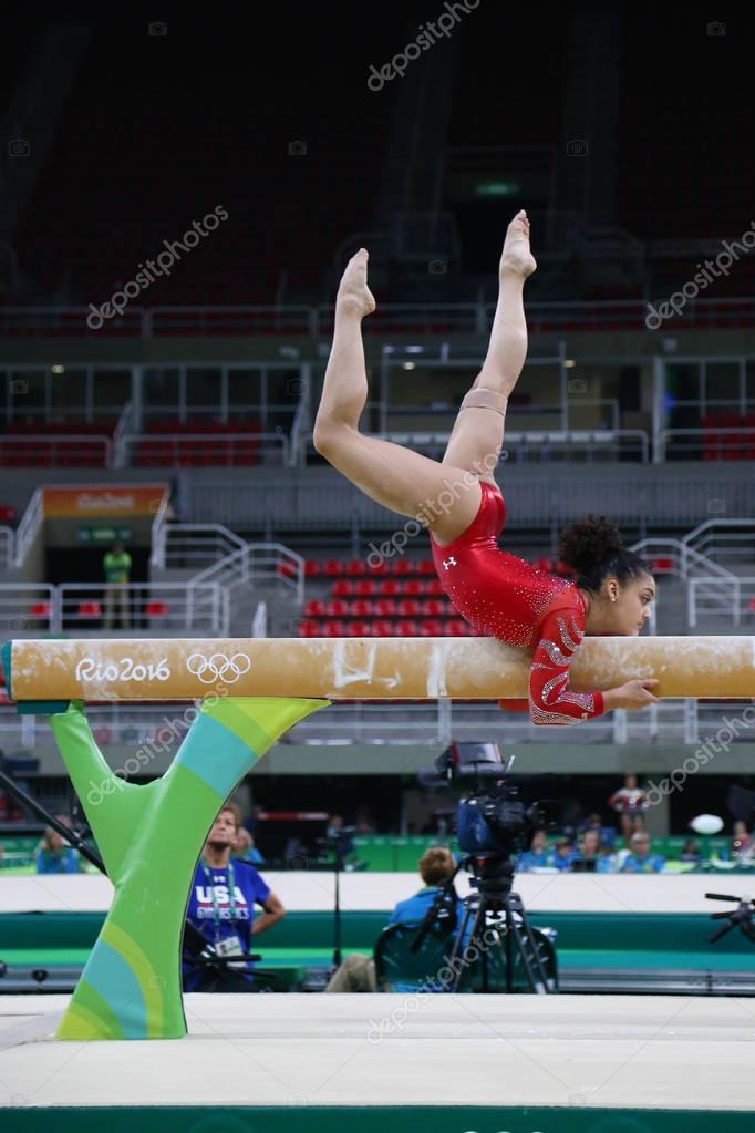 RIO DE JANEIRO, BRAZIL - AUGUST 4, 2016: Olympic champion Laurie Hernandez of United States practices on the balance beam before women's all-around gymnastics at Rio 2016 Olympic Games