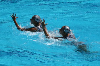 Huang Xuechen ve güneş Wenyan takımının Çin senkronize yüzme duets ücretsiz rutin başlangıç Rio 2016 Olimpiyat Oyunları sırasında rekabet 