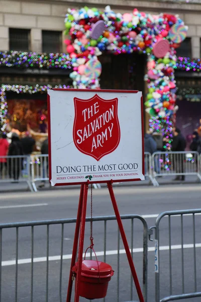 Salvation Army red kettle for collections in midtown Manhattan — Stock Photo, Image