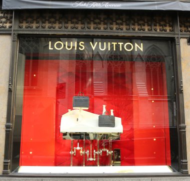 Louis Vuitton Holidays window display at Sacks Fifth Avenue luxury department store in Manhattan clipart