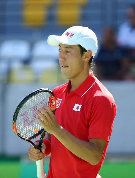 Jugador profesional de tenis Kei Nishikori de Japón en acción durante su partido individual masculino semifinal de los Juegos Olímpicos de Río 2016 — Foto de Stock