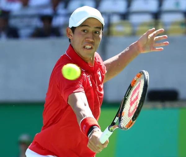 Eylem sırasında onun erkek profesyonel tenis oyuncusu Kei Nishikori Japonya'nın yarı final maç Rio 2016 Olimpiyat Oyunları singles — Stok fotoğraf