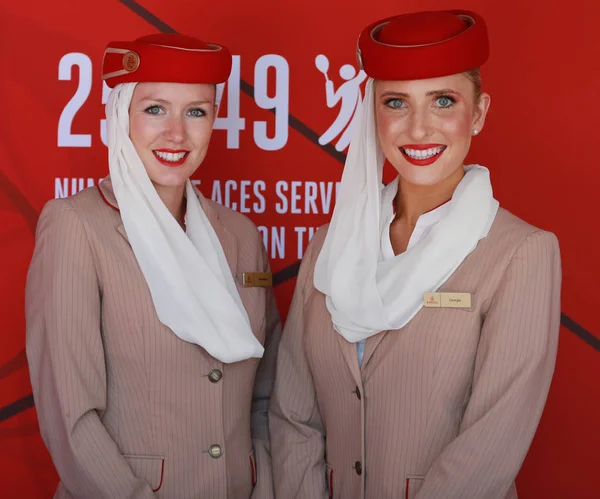 Emirates Airlines flight attendants at he Emirates Airlines booth at the Billie Jean King National Tennis Center during US Open 2016 — Stock Photo, Image