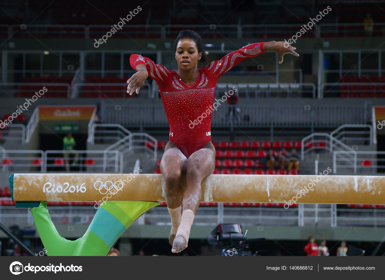 Olympic champion Gabby Douglas of United States practices on the