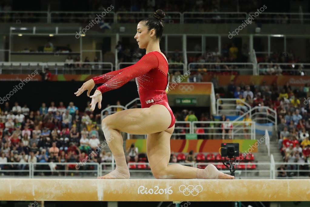 RIO DE JANEIRO, BRAZIL - AUGUST 11, 2016: Olympic champion Aly Raisman of United States competes on the balance beam at women's all-around gymnastics at Rio 2016 Olympic Games