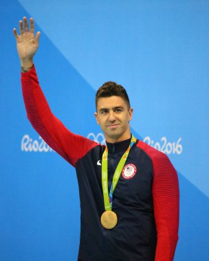 Olympic Champion Anthony Ervin of United States during medal ceremony after Men's 50m Freestyle final of the Rio 2016 Olympics  clipart