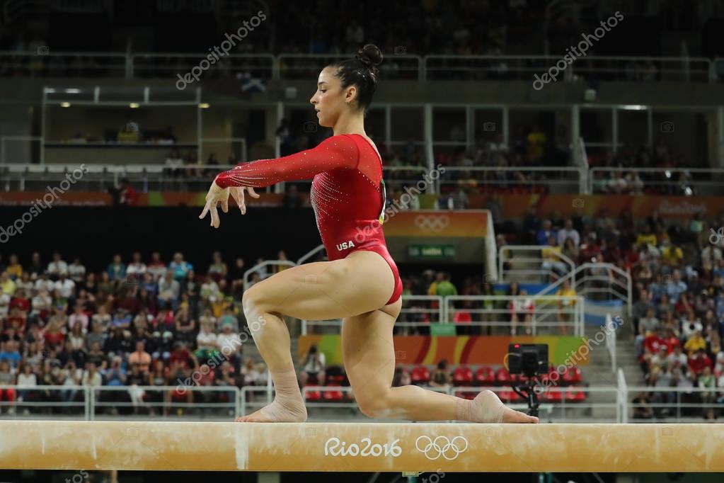 RIO DE JANEIRO, BRAZIL - AUGUST 11, 2016: Olympic champion Aly Raisman of United States competing on the balance beam at women's all-around gymnastics at Rio 2016 Olympic Games