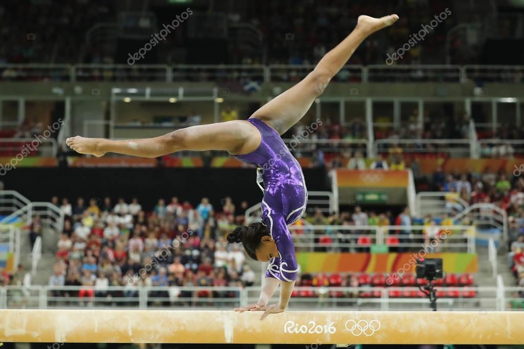 RIO DE JANEIRO, BRAZIL - AUGUST 11, 2016: Brazilian artistic gymnast Rebeca Andrade competes on the balance beam at women's all-around gymnastics at Rio 2016 Olympic Games