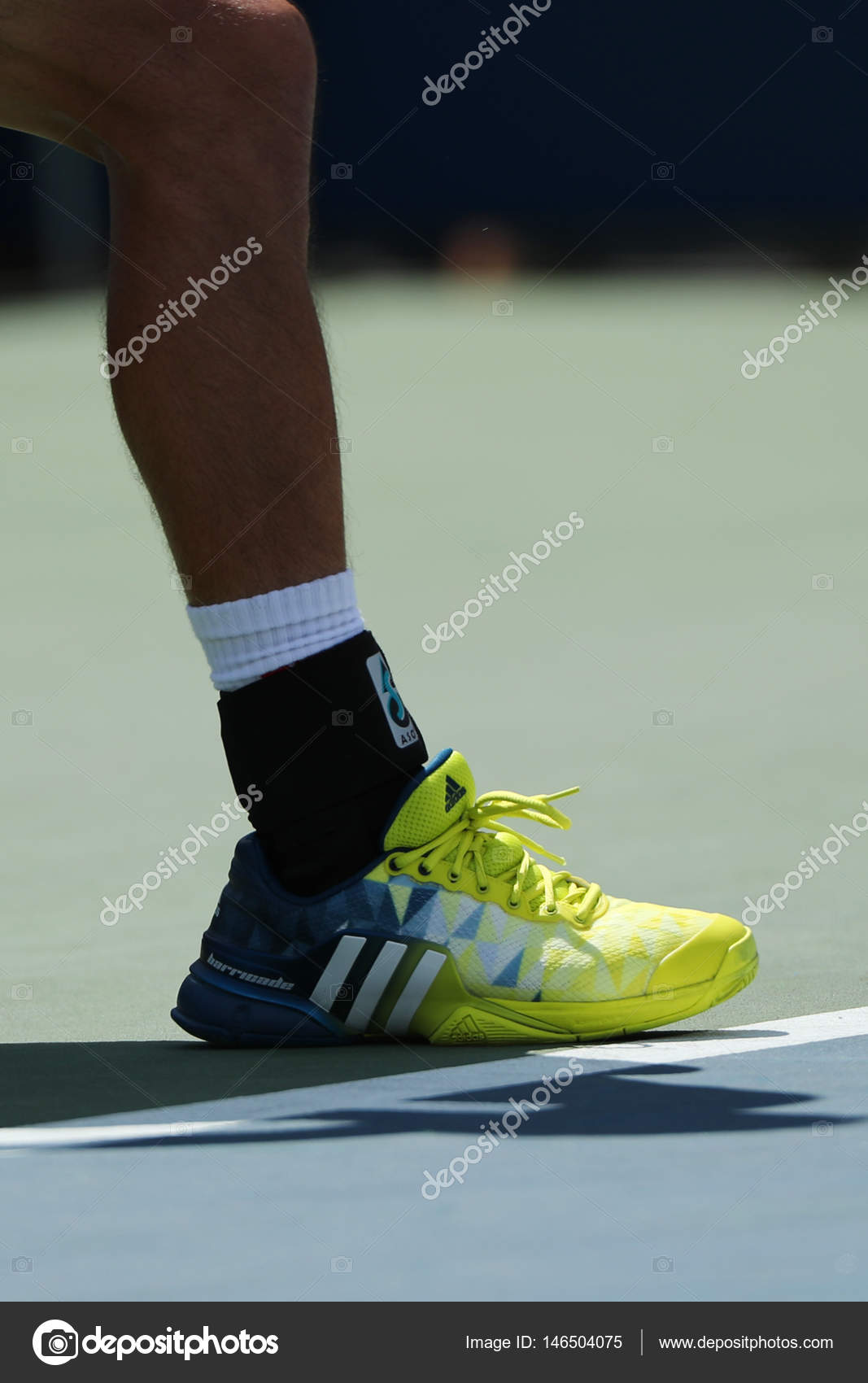 Professional tennis player Kei Nishikori of Japan wears custom Adidas  tennis shoes during match at US Open 2016 – Stock Editorial Photo ©  zhukovsky #146504075