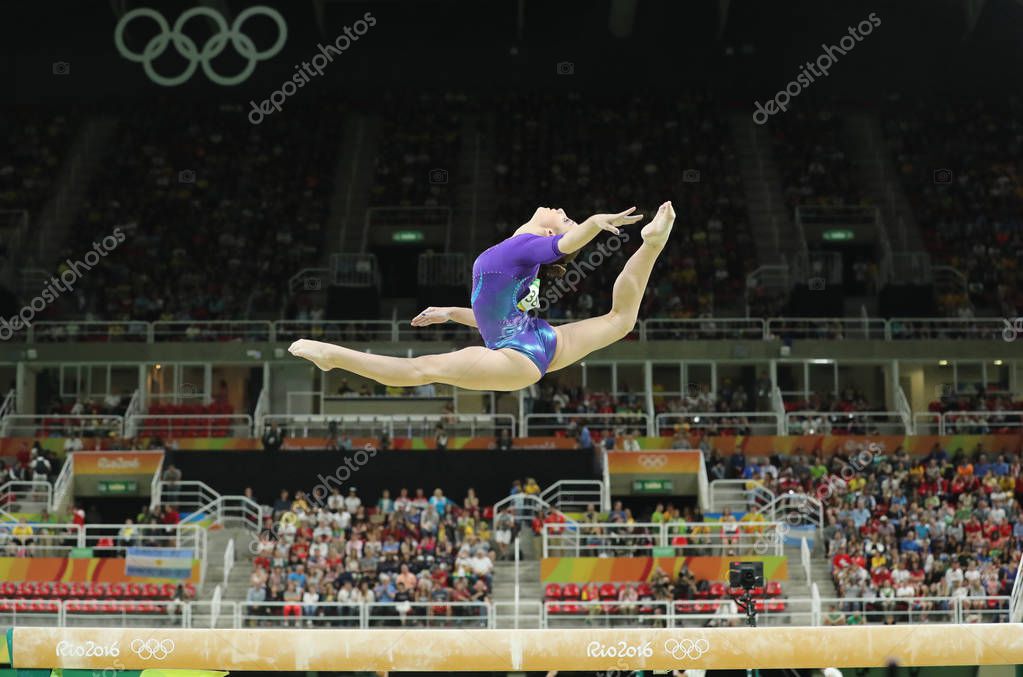 RIO DE JANEIRO, BRAZIL - AUGUST 11, 2016: Artistic gymnast Aliya Mustafina of Russian Federation competes on the balance beam at women's all-around gymnastics at Rio 2016 Olympic Games