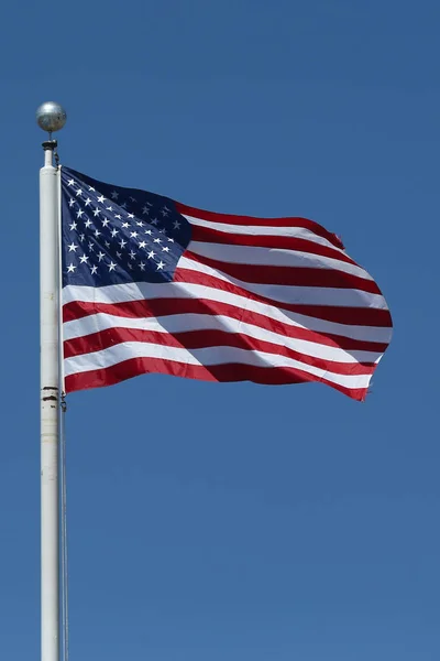 American flag flying high — Stock Photo, Image