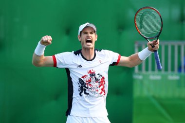 Olympic champion Andy Murray of Great Britain celebrates victory after men's singles quarterfinal of the Rio 2016 Olympic Games at the Olympic Tennis Centre clipart
