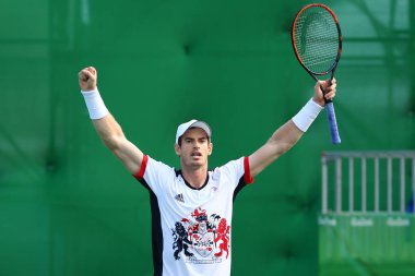 Olympic champion Andy Murray of Great Britain celebrates victory after men's singles quarterfinal of the Rio 2016 Olympic Games at the Olympic Tennis Centre clipart