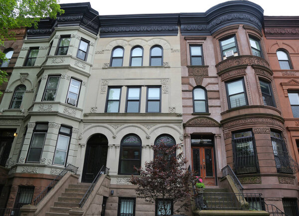 BROOKLYN, NEW YORK - MAY 11, 2017: New York City brownstones at historic Prospect Heights neighborhood. Prospect Heights is an affluent residential neighborhood within the New York borough of Brooklyn