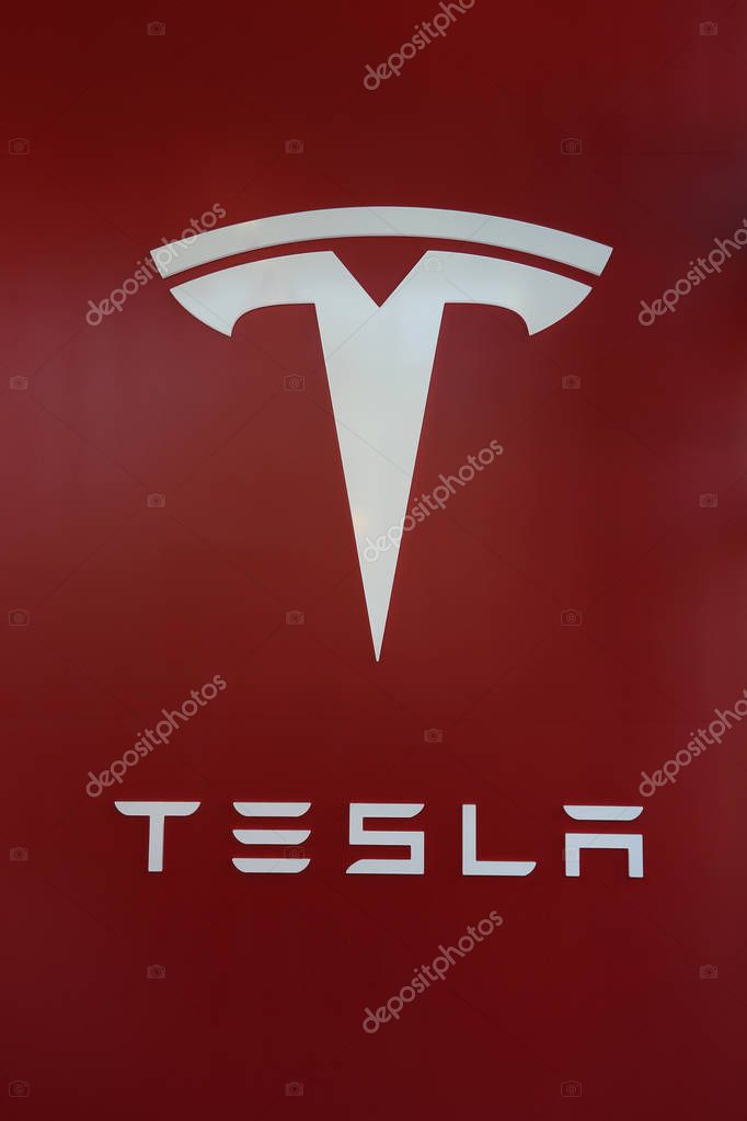 BROOKLYN, NEW YORK - MAY 21, 2017: Tesla Logo sign at the new Tesla dealership at Red Hook in Brooklyn, New York