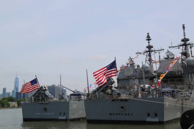 US Navy Ticonderoga-class cruisers USS San Jacinto and USS Monterey docked in Brooklyn Cruise Terminal during Fleet Week 2017 in New York.  clipart
