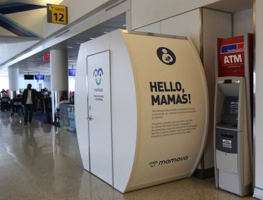 Mamava Suite for nursing mamas is a place for women to pump or breastfeed inside of JetBlue Terminal 5 clipart