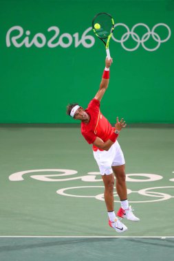 Olimpiyat Şampiyonu İspanya Rafael Nadal erkekler çiftler sırasında eylem yuvarlak 3 Rio 2016 Olimpiyat Oyunları
