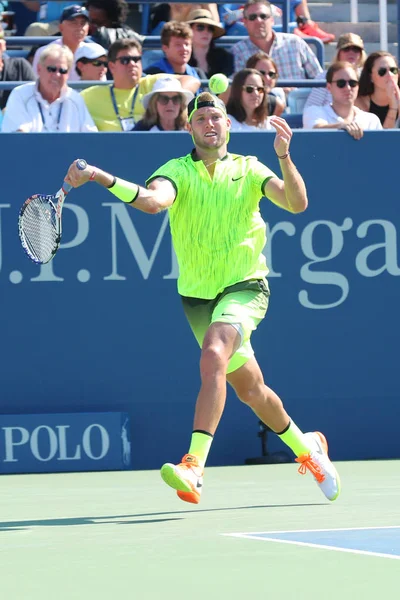 Professionel tennisspiller Jack Sock of United States i aktion under sin runde fire kamp på US Open 2016 - Stock-foto