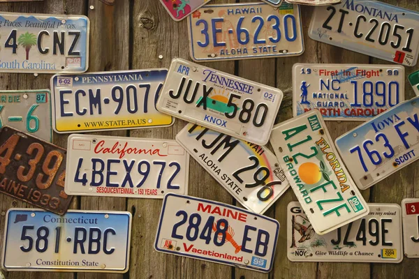 Old car license plates on the wall — Stock Photo, Image