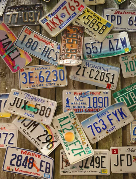 Old car license plates on the wall — Stock Photo, Image