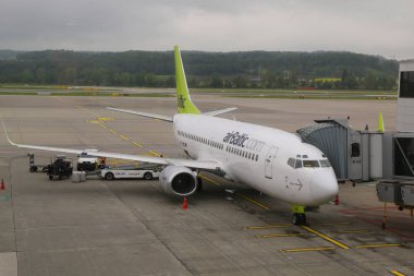 AirBaltic plane on tarmac at Zurich Airport. clipart