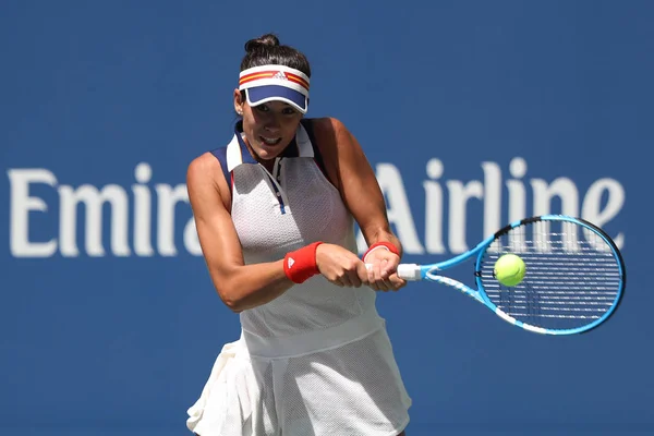 Великого шолома чемпіон Garbina Muguruza Іспанії в дії під час її нам відкрити 2017 року перший раунд матчу — стокове фото