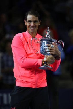 US Open 2017 champion Rafael Nadal of Spain posing with US Open trophy during trophy presentation after his final match victory clipart