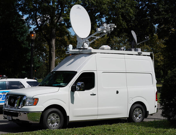  TV station truck in the front of Billie Jean King National Tennis Center in New York 